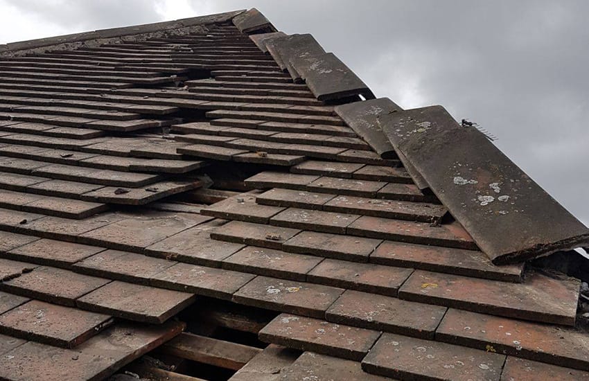 Replacing broken or slipped tiles and slates